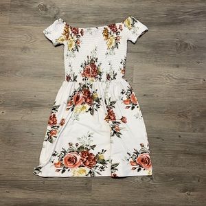 This is a super soft off the shoulder dress with a gorgeous floral print